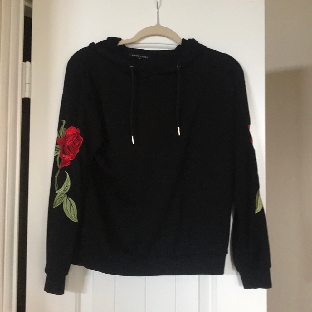 Black hoodie with red rose and green leaf detail